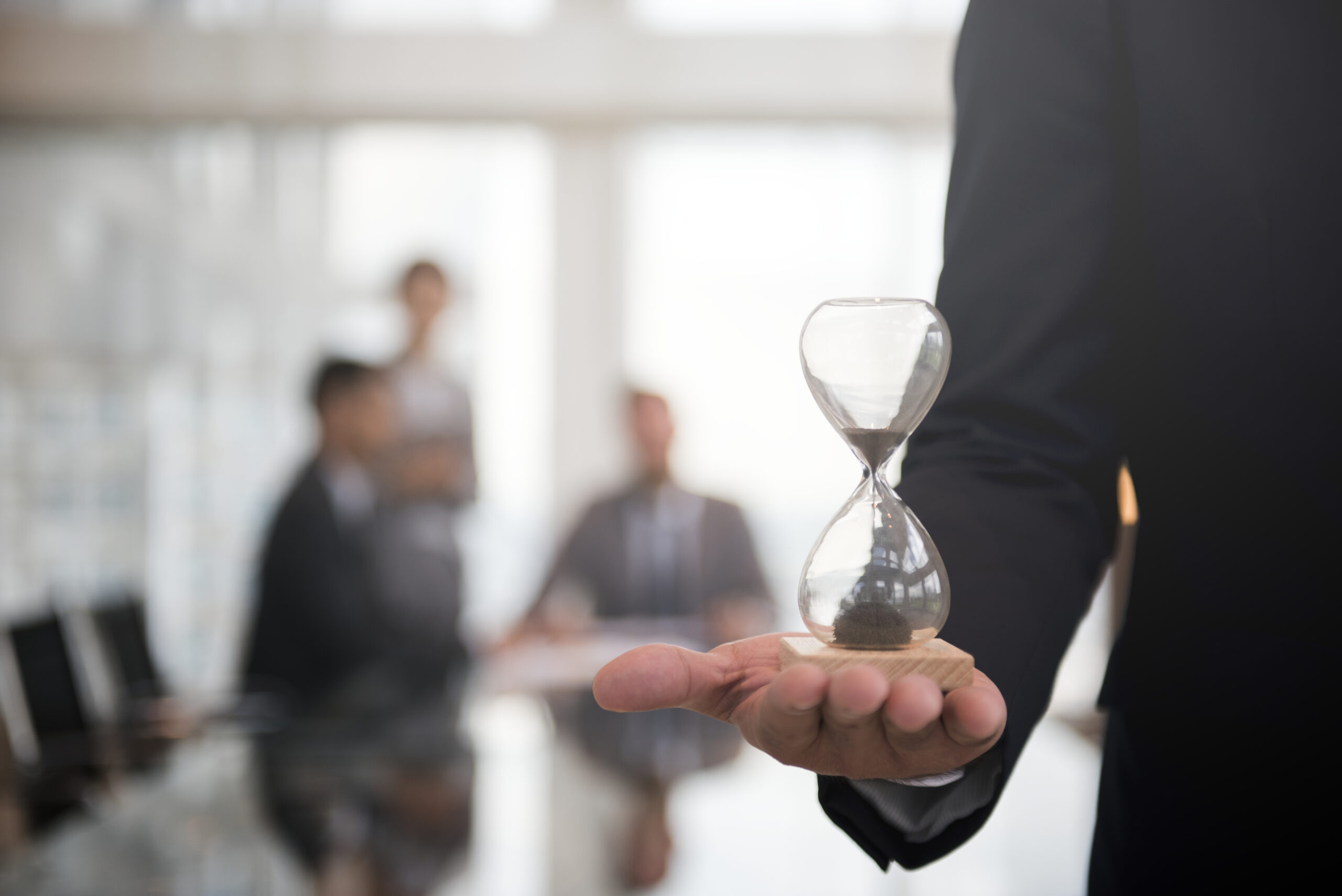 Person Holding Hourglass